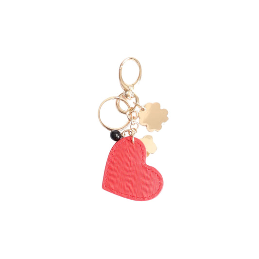 foto retro Portachiavi donna dorato con ciondolo quadrifoglio nero e cuore rosso Liu Jo