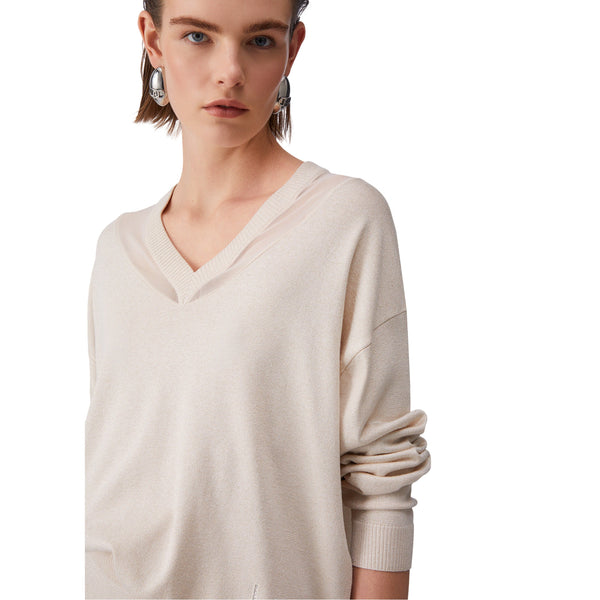 Maglia da Donna chamapgne con scollo a V a maniche lunghe dettaglio