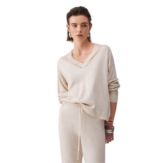 Maglia da Donna chamapgne con scollo a V a maniche lunghe