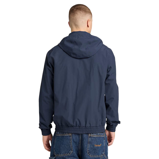 Bomber impermeabile in blu scuro con cappuccio ripiegabile