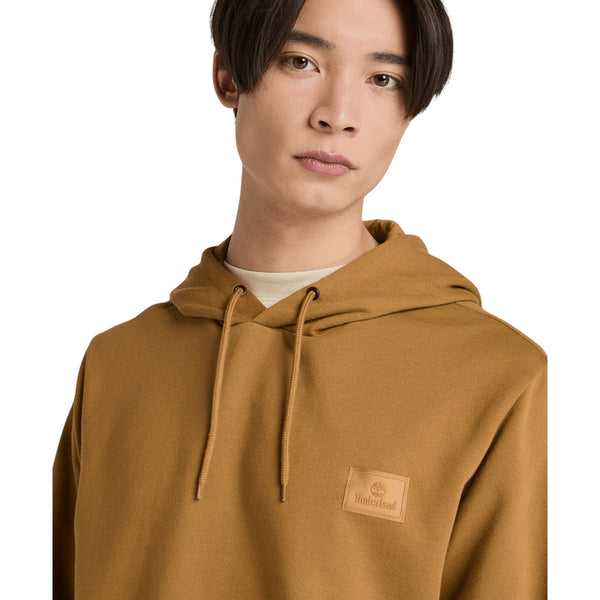 Felpa Unisex Brushback con logo in silicone Giallo modello frontale ravvicinato