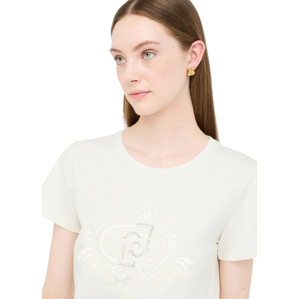 T-shirt Donna con motivo floreale con strass e logo modella frontale ravvicinata