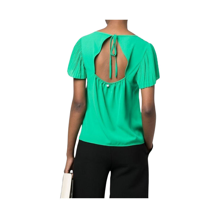 Blouse femme couleur unie avec hublot au dos