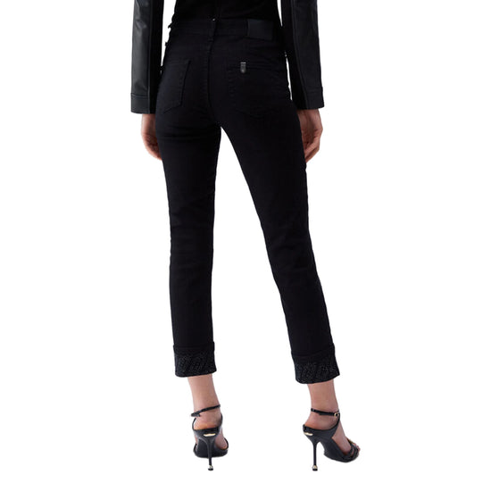 Pantaloni skinny Donna con risvolto e strass Nero modella retro