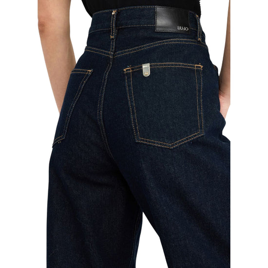 Jeans Donna cropped a vita alta carrot fit dettaglio retro ravvicinato