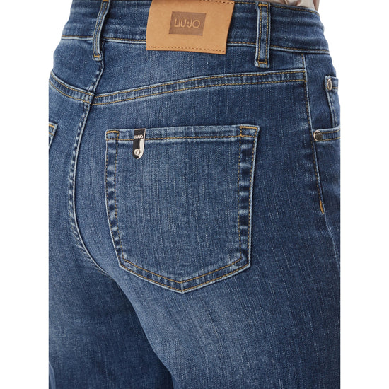 Jeans Donna a zampa in denim blu dettaglio retro