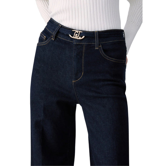 Jeans Donna scuro, modello flare, con fibbia logata