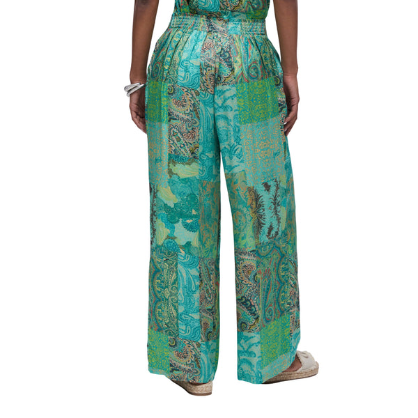 Pantalone Donna a gamba larga con fantasia modella retro