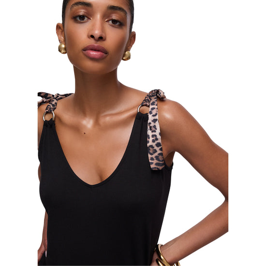 Top nero con fiocchi animalier e scollo a V