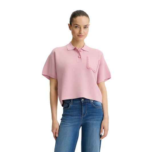 Polo Donna in maglia con perle rosa modella frontale