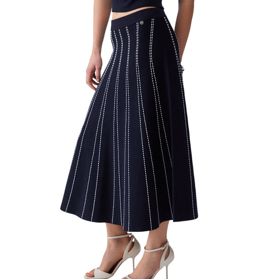 Gonna blu lunga in maglia con cuciture bianche