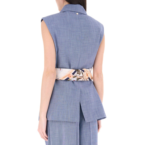 Gilet azzurro monopetto con cintura floreale 