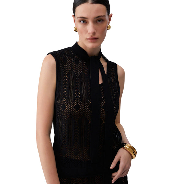 Top in maglia nero con fiocco