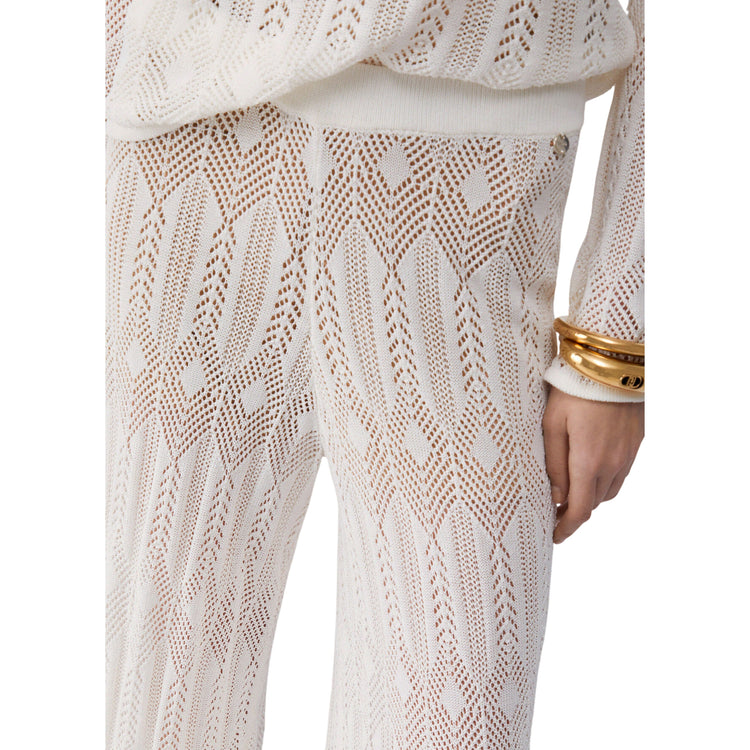 Pantaloni bianchi lunghi in maglia traforata