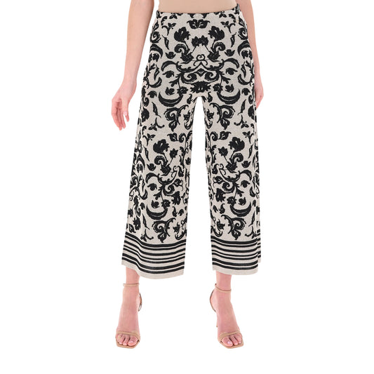 Pantalone cropped in maglia con stampa floreale