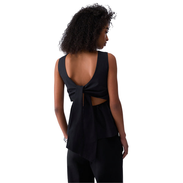 Top da donna con fiocco scoperto sulla schiena in nero