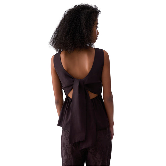 Top da donna con fiocco posteriore in marrone