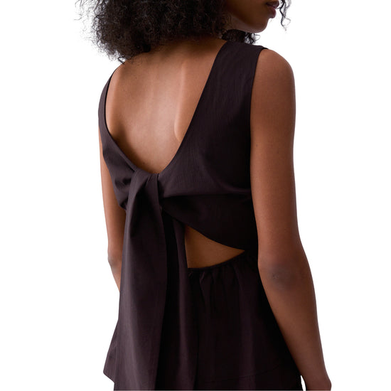 Top da donna con fiocco posteriore in marrone