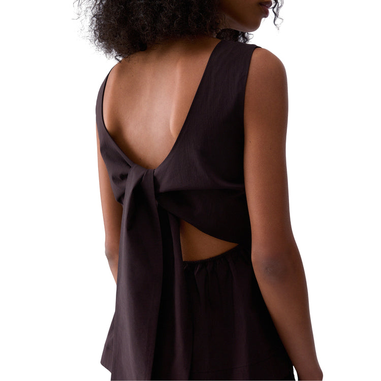 Top da donna con fiocco posteriore in marrone