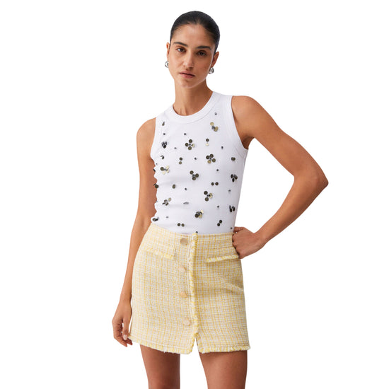 Top bianco con applicazioni dorate