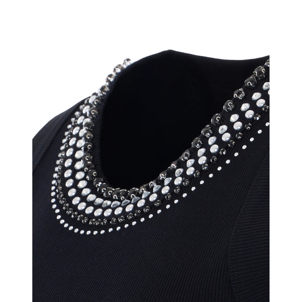 Canottiera nera con borchie bianche e nere