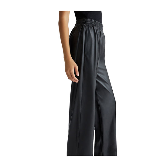 Pantaloni Donna in tessuto spalmato Nero modella laterale