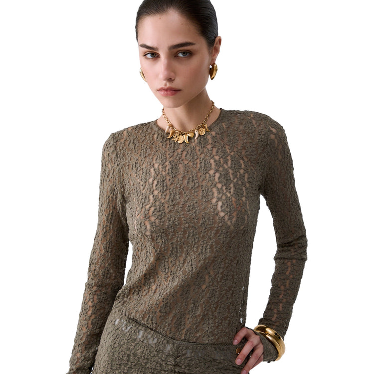 Top Donna in pizzo verde modella ravvicinata