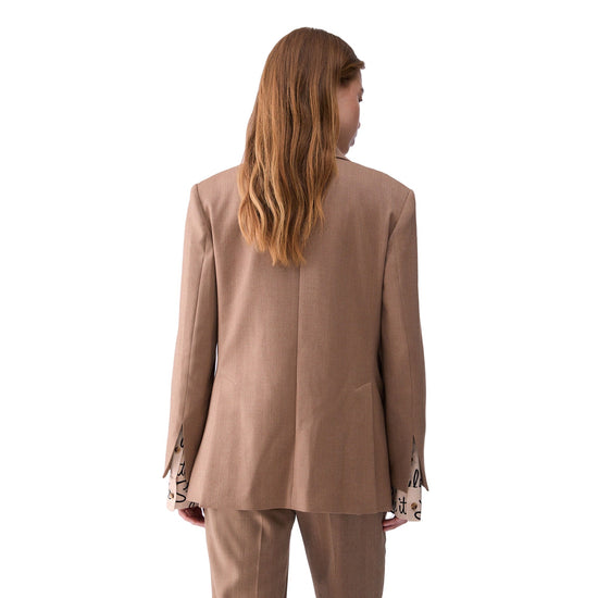 Giacca Donna Beige con polsi stampati modella retro