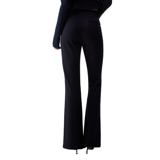 Pantalone flare Donna in punto Milano blu scuro modella retro