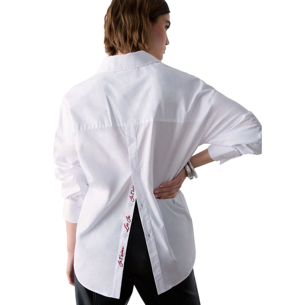 Camicia Donna con spacco retro in colore bianco modella retro