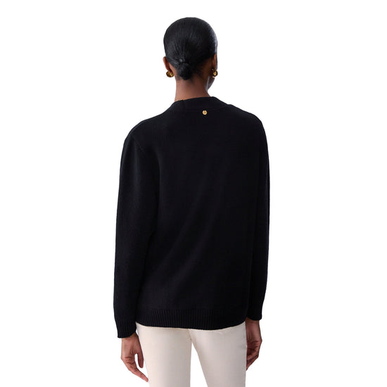 Cardigan Donna con bottoni gioiello Nero modella retro