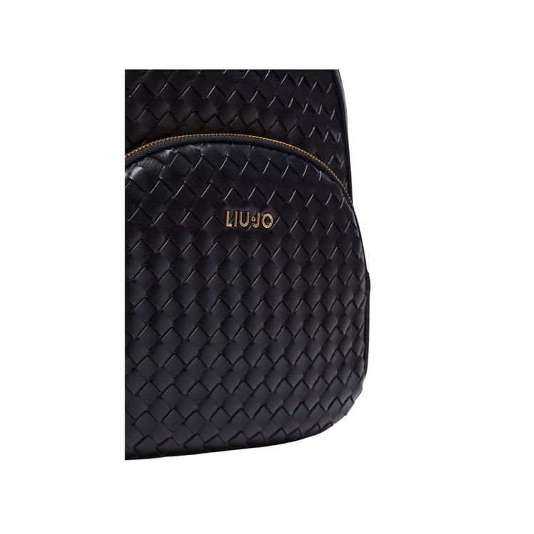 Dettaglio ravvicinato tasca frontale con zip ed effetto nappa intrecciata colore Nero
